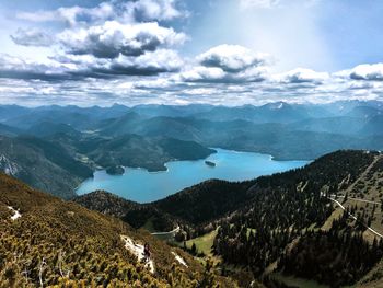 Scenic view of landscape and mountains against sky