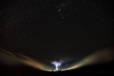 Low angle view of stars in sky at night