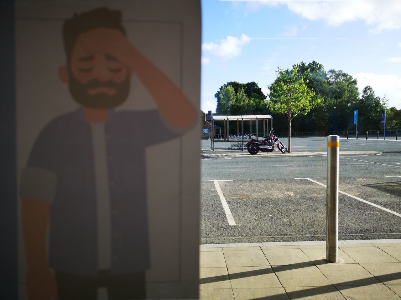 SHADOW OF MAN ON ROAD IN CITY