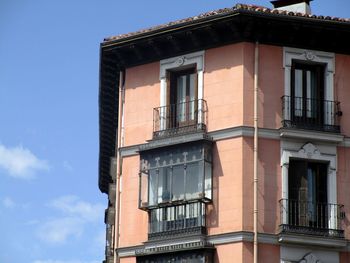 Low angle view of residential building against sky