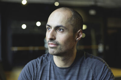 Close-up of thoughtful man looking away