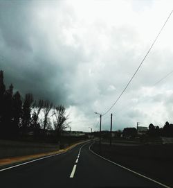 Road against cloudy sky