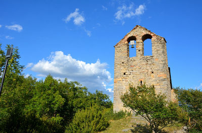 Low angle view of old building against sky