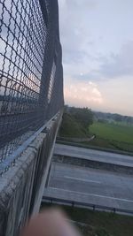 Scenic view of field against sky during sunset