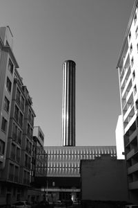 Low angle view of skyscrapers against clear sky