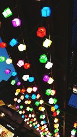 Low angle view of illuminated colorful lights