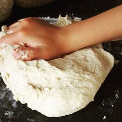 Close-up of hand holding ice cream