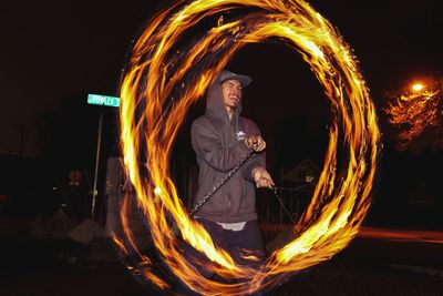 Light trails on fire at night