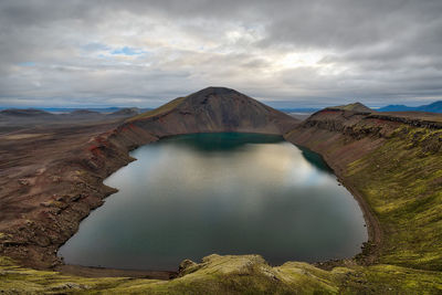 Scenic view of volcanic mountain against sky