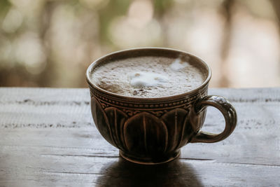 Close-up of coffee on table