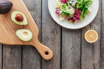 High angle view of fruits on cutting board