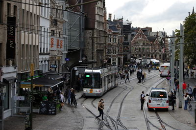 People walking on street in city