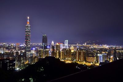 Illuminated cityscape at night