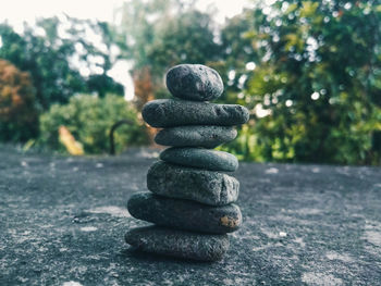 Close-up of stone stack on rock