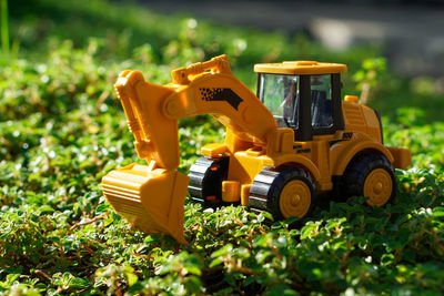 Close-up of toy car on field