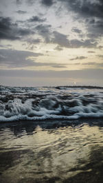 Scenic view of sea against sky during sunset