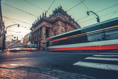 Blurred motion of tramway on road in city