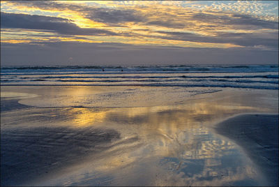 View of sea against cloudy sky