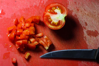 High angle view of chopped fruits on cutting board