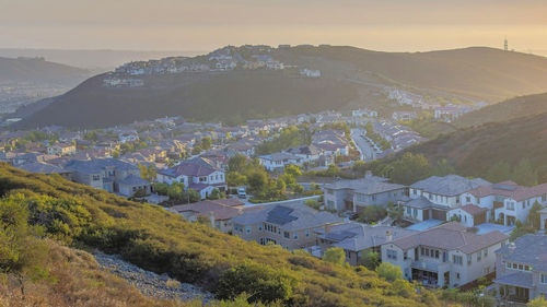 High angle view of townscape against sky during sunset