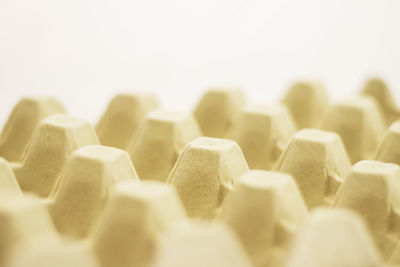 Close-up of cake on white background