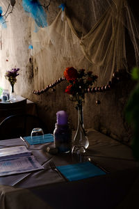 Flower vase on table