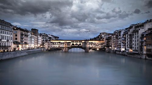 View of bridge over river in city