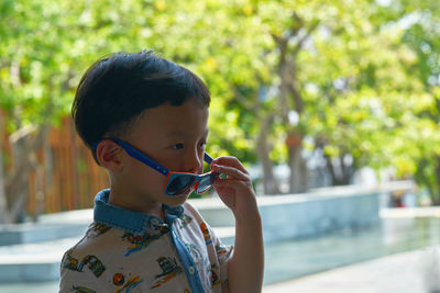 Boy wearing sunglasses