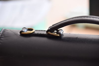 Close-up of metal on table