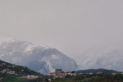 Scenic view of snowcapped mountains against sky