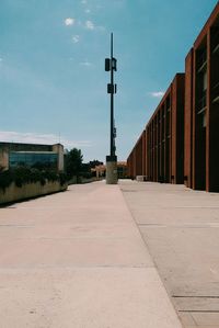 Street light against blue sky