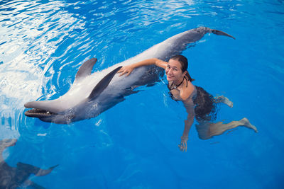 Full length of woman swimming in sea