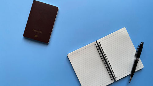 Low angle view of pen against clear blue sky