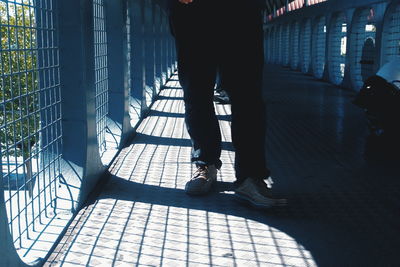 Low section of people walking in city