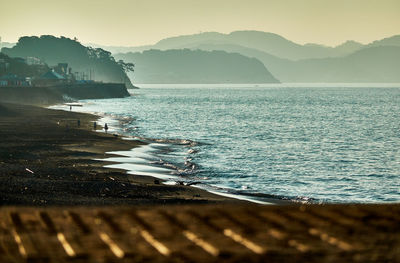 Scenic view of sea against sky during sunrise