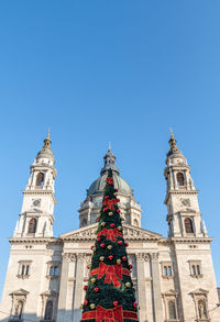 Christmas tree in front of saint stephen's basilica or szent istvan bazilika in budapest, hungary