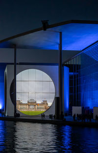 Modern building in city at night