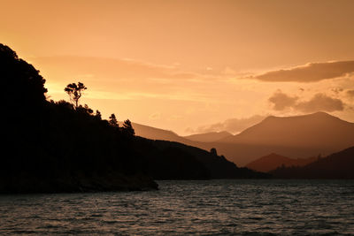 Scenic view of mountains at sunset