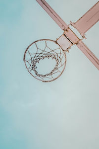 Low angle view of basketball hoop against sky