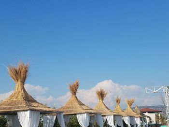 Low angle view of roof against clear blue sky