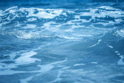 Close-up of water splashing in sea