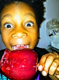Close-up portrait of boy holding ice cream