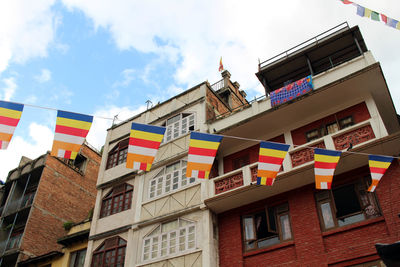 Low angle view of buildings against sky