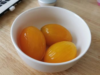 High angle view of fruits in bowl on table
