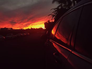 Car against sky during sunset