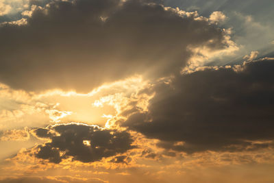 Low angle view of clouds in sky during sunset