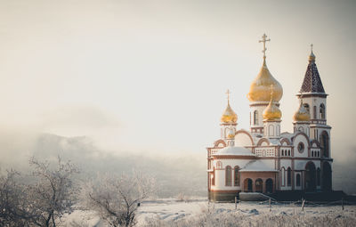 Church on snow covered landscape