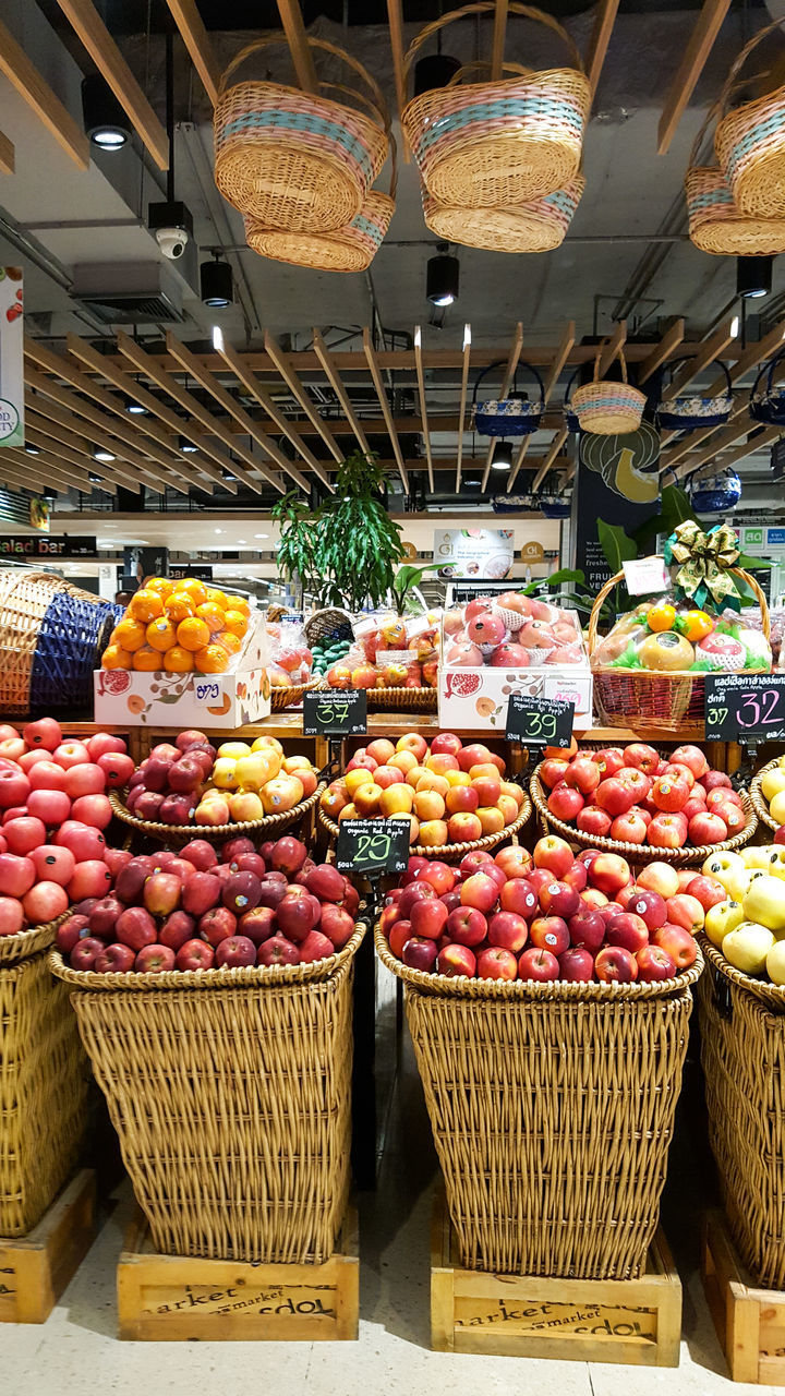 VARIOUS FRUITS IN MARKET STALL FOR SALE