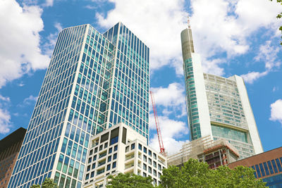 Low angle view of modern buildings against sky