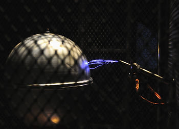 Close-up of illuminated light bulb